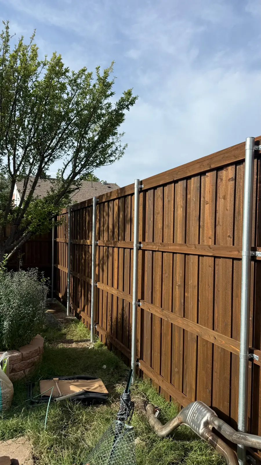 Rails framed and clamped to steel posts